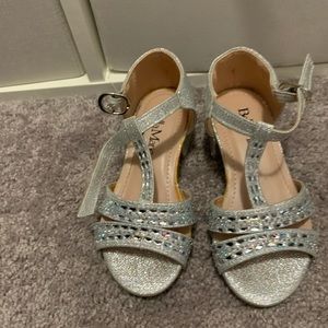 Silver child heels shoes.